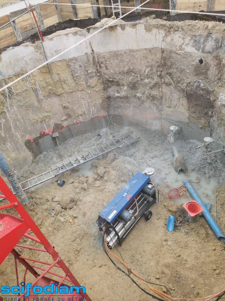 Réalisation d'une ouverture de 8m de haut sur un puits d'accès dans le secteur de Saint-Denis 93